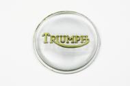 This is a silver and gold badge foe the top of the tank on a triumph motorcycle. 