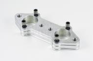 This is a duel carburetor straight manifold set for a TR6 triumph motorcycle.